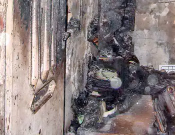 مهار شعله‌های آتش دفترخانه اسناد رسمی در خرم‌آباد+ عكس